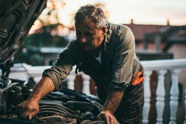 Mechanic repairing car