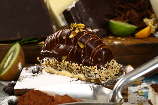 istock Malaga Dessert / Chocolate Eclairs with banana 994848922