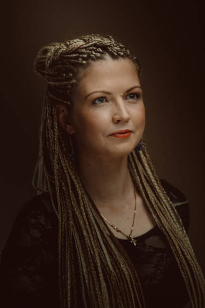istock Studio portrait of young woman with braids 994849848