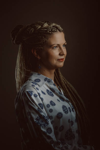 istock Studio portrait of young woman with braids 994850014