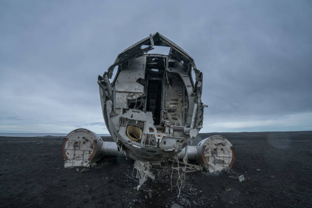 istock Front of Airplane wreck on beach Iceland, DC3 navy plane 994850618