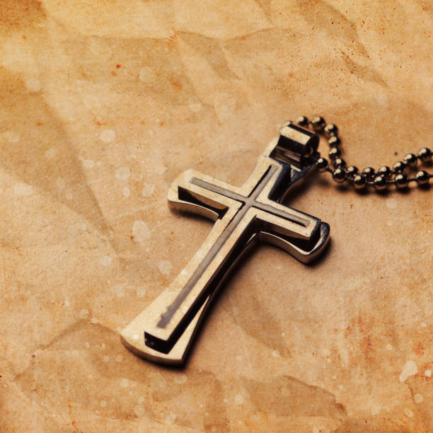 istock Closeup of silver Christian cross 994860284