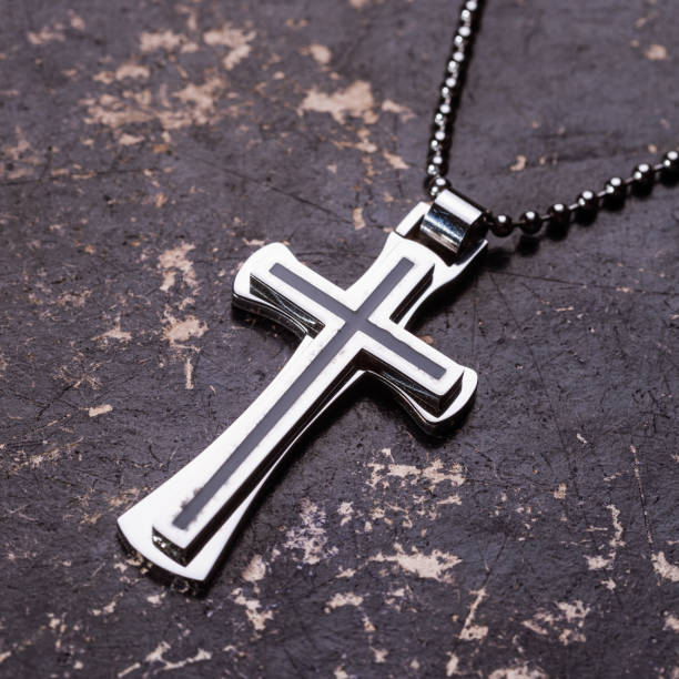 istock Closeup of silver Christian cross 994860298