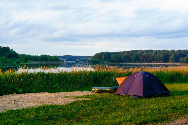 istock camping tent near a lake 994869290