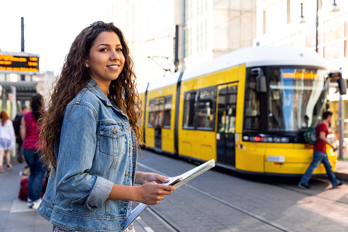 Young woman on travel in Berlin - Germany during summer holidays