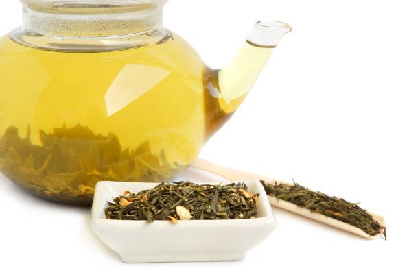istock Tea leaves and teapot 994872528