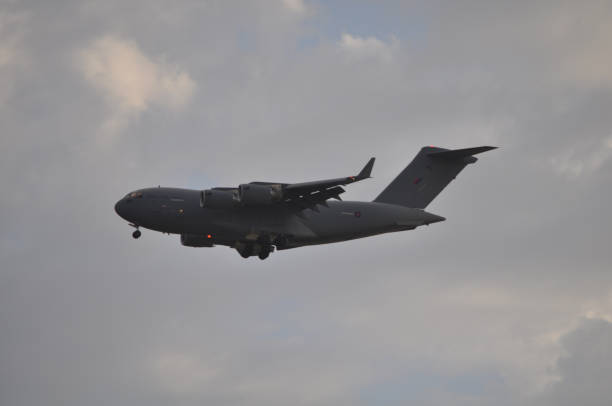 istock Military transport aircraft in flight 994891250