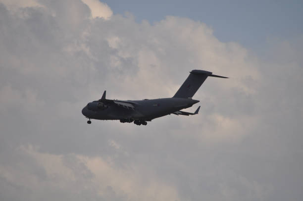 istock Military transport aircraft in flight 994891296