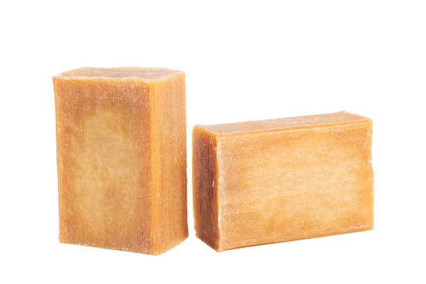 istock Two brick of brown common soap isollated on white background 994918518