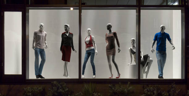 Mannequins in fashion shop, display window, interior design Mannequins in fashion shop, display window, interior design store window stock pictures, royalty-free photos & images