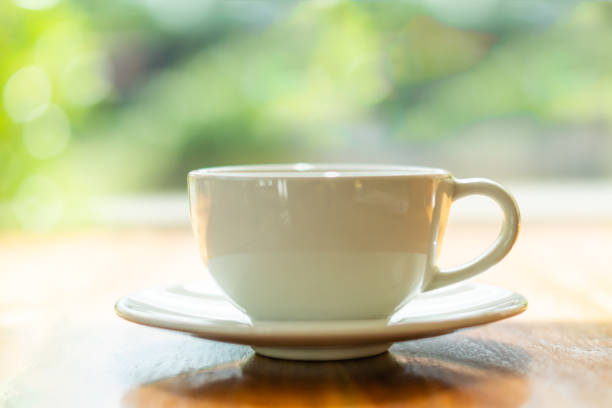 istock cup of hot coffee on wood table 994958652