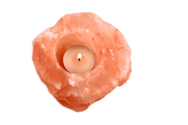 Salt lamp on a white background. Classic himalayan salt rock crystal lamp