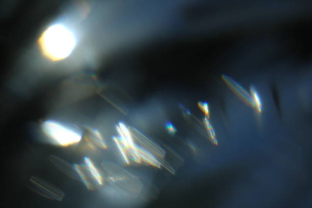 istock Abstract background of blue luminous rays and lens flare. 994964746