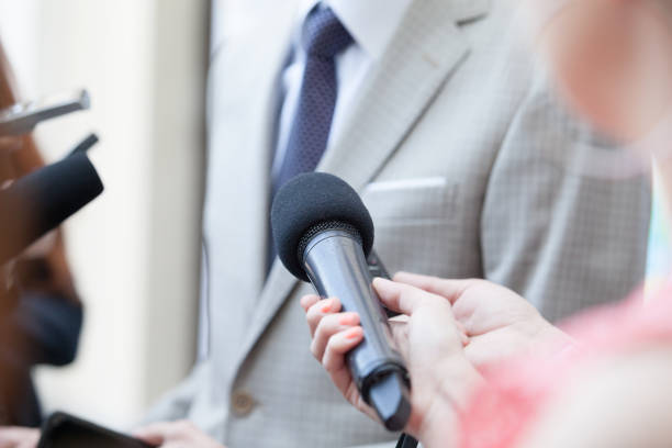 istock Journalists making media interview with unrecognizable politician or businessman 994970076