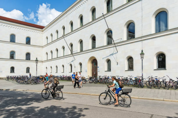 Munich, Germany June 09, 2018: The Ducal Georgianum (German: Herzogliches Georgianum) is a theological seminary of the Ludwig Maximilians University in Munich. Parked bikes next to the building.
