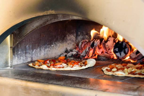 istock Wood fired oven Italian pizza 994979748