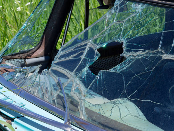 istock Old green car left abandoned in a field 994991894