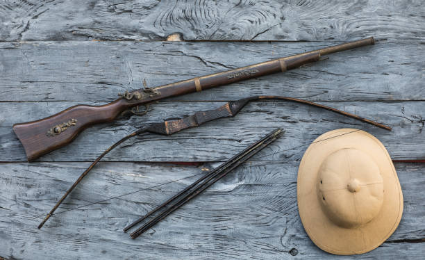 istock safari, bow and arrow, vintage hunter helmet 995002138