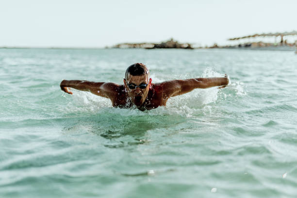 istock Man swimming on the Crete Island 995002144