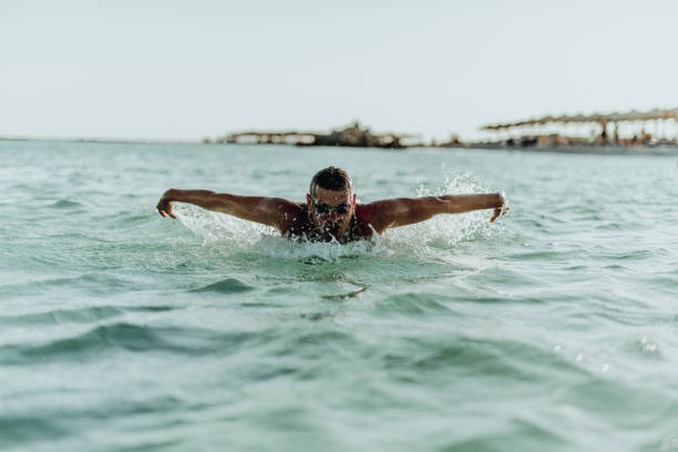 istock Man swimming on the Crete Island 995002190