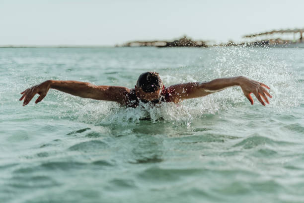 istock Man swimming on the Crete Island 995002192