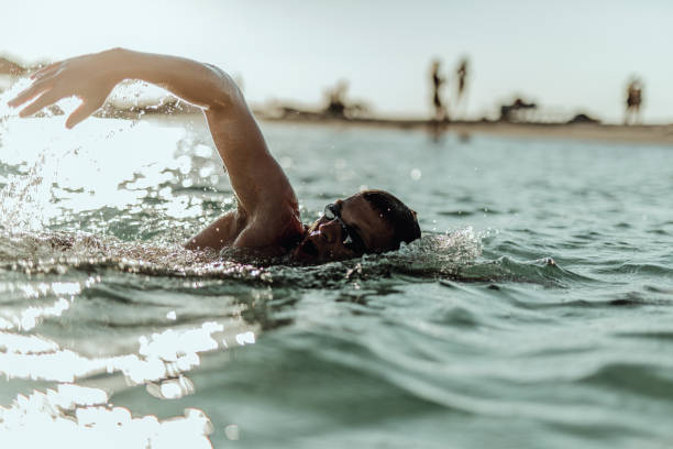istock Man swimming on the Crete Island 995002254