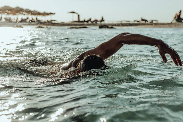 istock Man swimming on the Crete Island 995002454