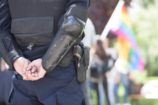 istock Police officer on duty during LGBT pride parade 995002608