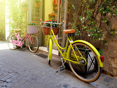 Colorful vintage bikes in old street in Rome