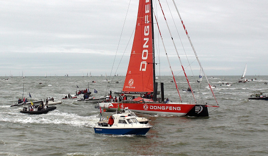 The Hague, Netherlands - June 19, 2015: The yachts in a row at the Volvo Ocean Race Stopover Festival in Scheveningen. VOR is a sail yacht race around the world.