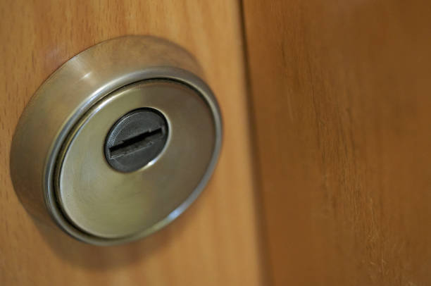 istock safe lock in a wooden table 995019386