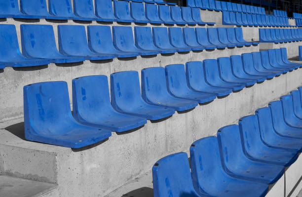 istock Blue soccer stadium seats 995019506