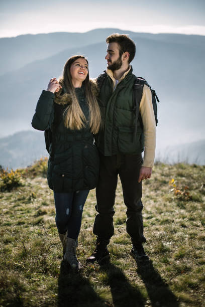 istock Young couple enjoying in nature. 995019516