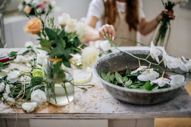 istock Florist making floral arrangement 995024958