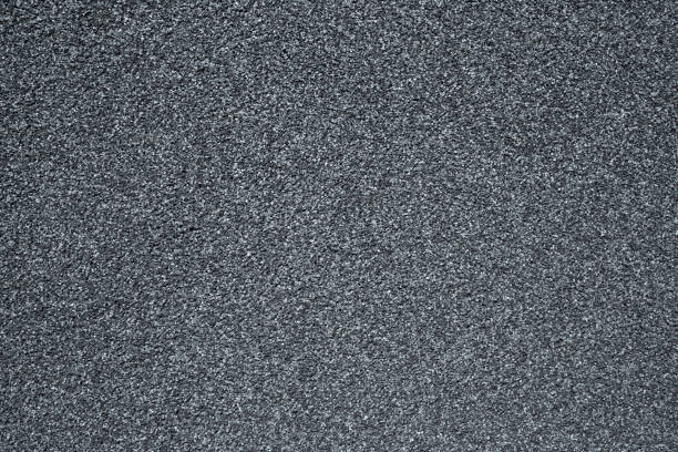 istock A wall covered with a stone crumb in gray color 995027090
