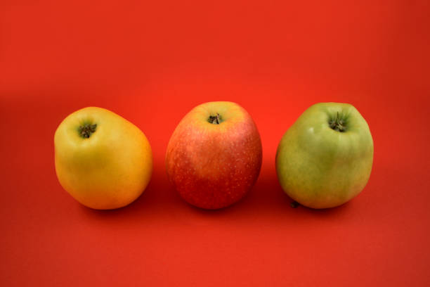 istock Three colorful apples stock images 995038572