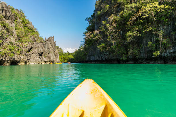 istock Canoe tour in a lagoon in the Philippines 995043288