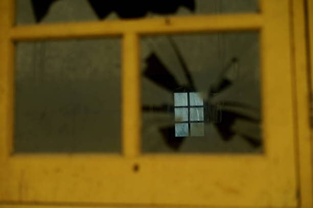 istock Broken glass of old window 995043306