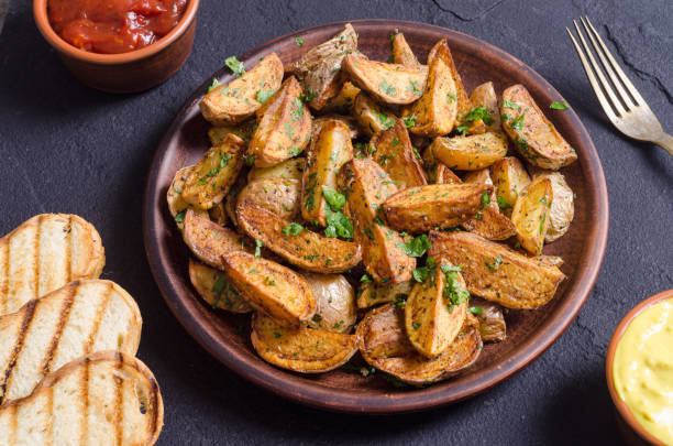 istock Roasted potato with parsley 995047824