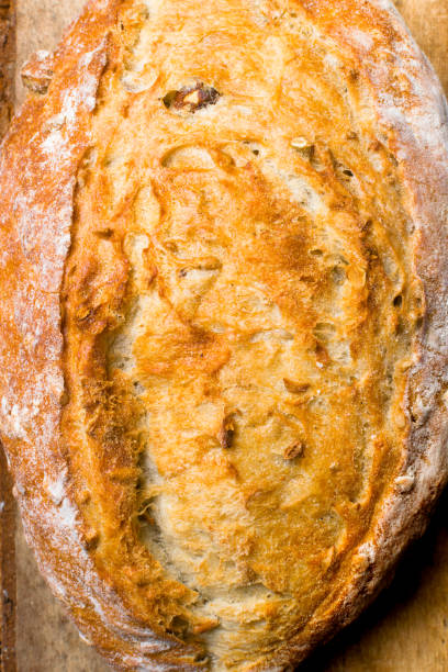 istock fresh bread on the wooden board 995064714