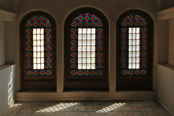 istock Stained glass window inside a traditional mansion in Kashan, Iran 995071740