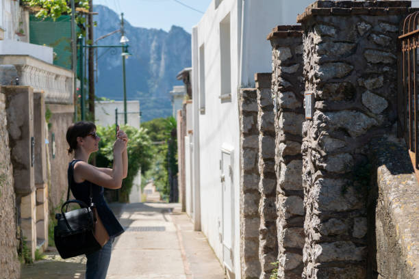 istock Woman taking photograph in Capri 995076794