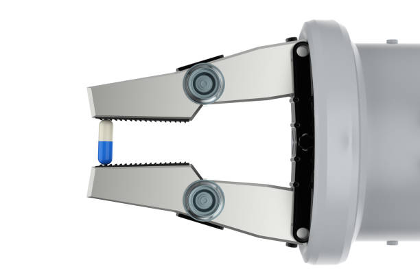 istock robot hand holding medical capsule 995117218
