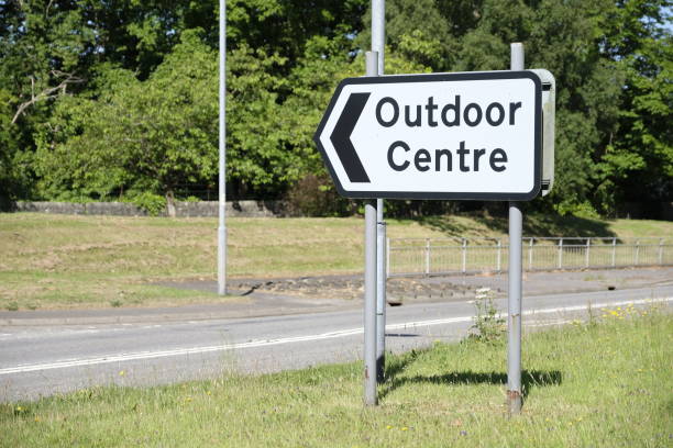 istock Outdoor centre road sign direction information 995228924
