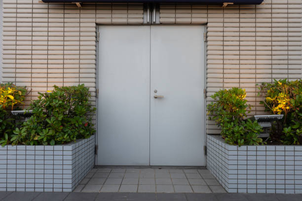 sidewalk by street wall & door