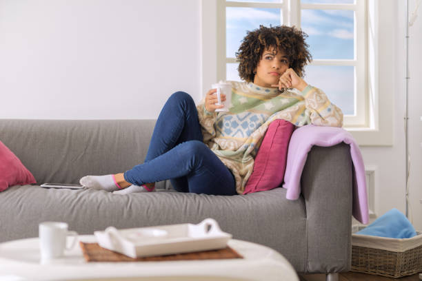 istock Young black woman drinking hot chocolate 995241648