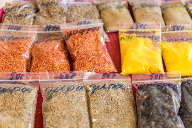 istock Assorted herbs and spices in clear plastic bags on the market 995244896
