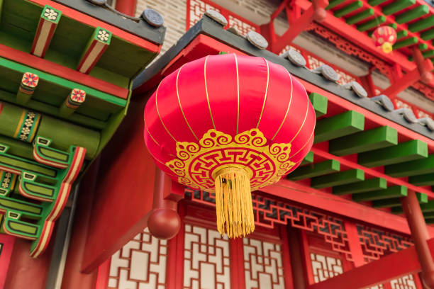 istock chinese red lantern hanging on the street as decoration 995247376