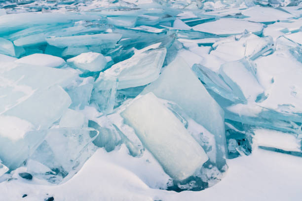 istock Breaking Ice surface, Russia Baikal winter season 995247896