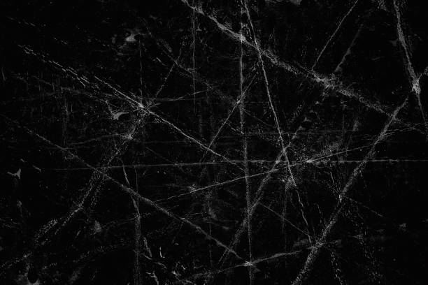 istock Grunge is black and white. Abstract monochrome background. Pattern of cracks, chips, scuffs, dust, stains 995255266